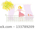 A woman enjoying the spring breeze on a balcony (color variations available) 133789209
