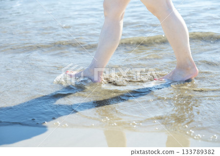Woman walking on the beach, walking, sunset, summer day, new days, beach, island, travel, trip 133789382