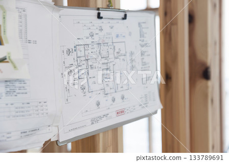 Blueprints displayed at a construction site Blueprints displayed at a construction site 133789691