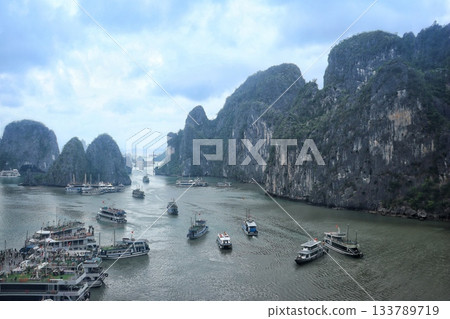 Small boat floating in Halong Bay 133789719