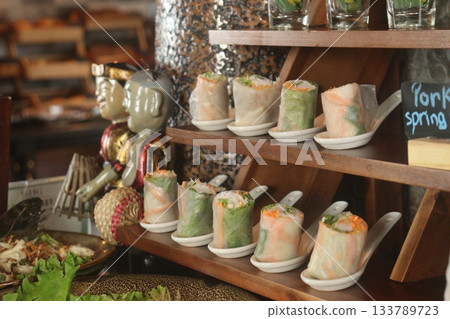 Fresh spring rolls at a breakfast buffet in a Vietnamese hotel Fresh spring rolls at a breakfast buffet in a Vietnamese hotel 133789723