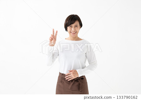 A woman with an apron 133790162
