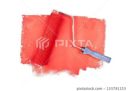 Red paint roller against white background Red paint roller against white background 133791153