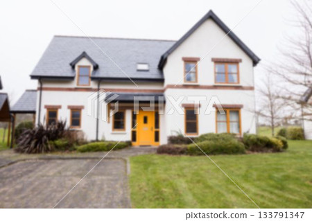 Facade of white house against sky Facade of white house against sky 133791347