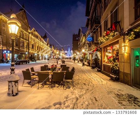 A sidewalk at night illuminated with winter lights 133791608