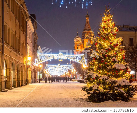 A decorated Christmas tree in a snowy town 133791610