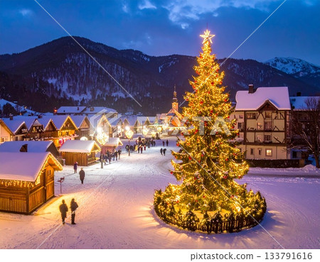 A decorated Christmas tree in a snowy town 133791616
