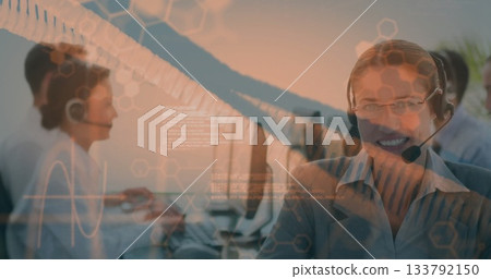 Smiling agent with headset handling calls at open-plan office, with digital overlays, copy space Smiling agent with headset handling calls at open-plan office, with digital overlays, copy space 133792150