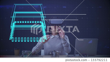 Person using virtual reality headset with digital circuit board image overlay 133792211