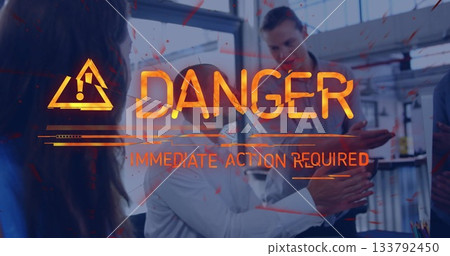 Danger warning text image over people discussing in modern office setting 133792450