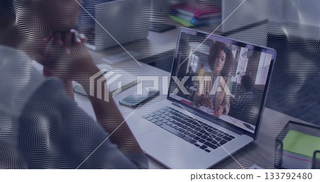 Image conferencing on laptop, person with image of digital wave pattern 133792480