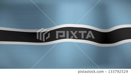 Rippling Botswana national flag gently in close-up view, with central black stripe edged in white 133792529
