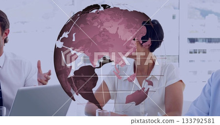 Discussing in meeting, diverse professionals with digital globe image overlaying table Discussing in meeting, diverse professionals with digital globe image overlaying table 133792581