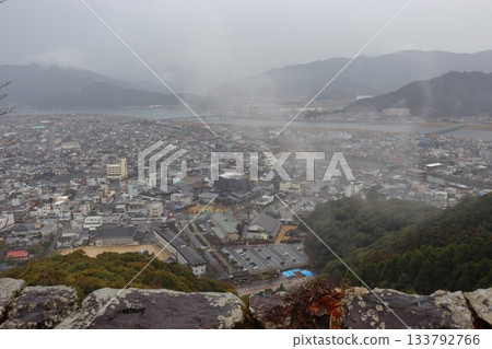 Saiki city and the Banjo River seen from the summit of the ruins of the main keep of Saiki Castle during the rainy season (Saiki City, Oita Prefecture) Saiki city and the Banjo River seen from the summit of the ruins of the main keep of Saiki Castle during the rainy season (Saiki City, Oita Prefecture) 133792766
