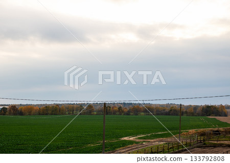 Serene rural landscape, Tranquil pastoral setting experiencing seasonal shifts and solitude Serene rural landscape, Tranquil pastoral setting experiencing seasonal shifts and solitude 133792808