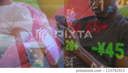 Analyzing financial overlays, two men sitting on cushioned lounge, holding coffee and smartphone Analyzing financial overlays, two men sitting on cushioned lounge, holding coffee and smartphone 133792915