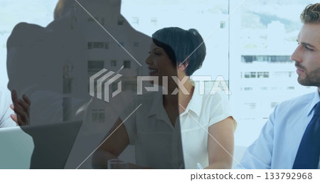 Discussing strategy three business professionals meeting at conference room glass table reflections 133792968