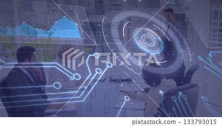 Presenting executive standing at head of table in office, with holographic charts and drone Presenting executive standing at head of table in office, with holographic charts and drone 133793015