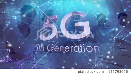 Collaborating business professionals reviewing documents around conference table, with 5G overlay Collaborating business professionals reviewing documents around conference table, with 5G overlay 133793036
