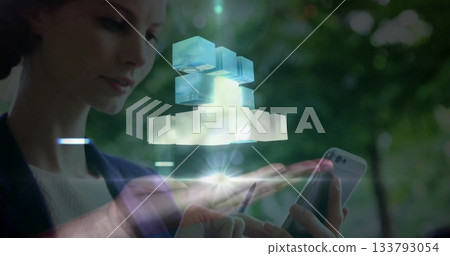 Projecting woman displaying hologram cubes in park with smartphone light flares, copy space Projecting woman displaying hologram cubes in park with smartphone light flares, copy space 133793054