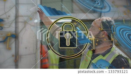 Positioning man in safety vest placing blue bar segments on panel at concrete site, with lock-icon 133793121