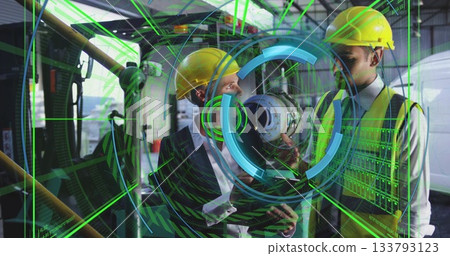 Engineers wearing helmets and vests inspecting turbine component in hangar, with AR overlays 133793123