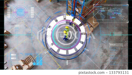 Monitoring two workers wearing yellow hard hats using holographic interface at warehouse with racks 133793131