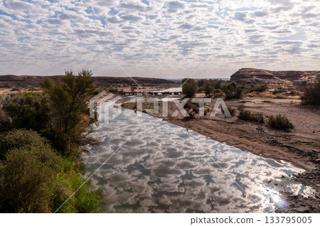 Clouds reflected in the Fish river Clouds reflected in the Fish river 133795005