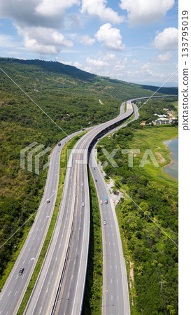 Drone shot The M6 motorway Nakhon Ratchasima Province - Bang Pa-in Lam Ta Khong River and Mountain. Motorway Korat Thailand 133795019