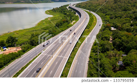 Drone shot The M6 motorway Nakhon Ratchasima Province - Bang Pa-in Lam Ta Khong River and Mountain. Motorway Korat Thailand 133795059