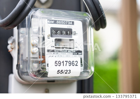 Electric measuring power meter for energy cost at home and office. 133795371