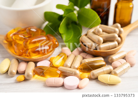 Alternative medicine herbal organic capsule drug herb. Alternative medicine herbal organic capsule drug herb. 133795373