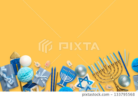 Colorful Hanukkah items arranged on a yellow background 133795568