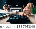 Close-up of hand pressing calculator with tax icons overlay, representing financial data analysis, tax return preparation, budgeting, and business accounting tasks. 133795849