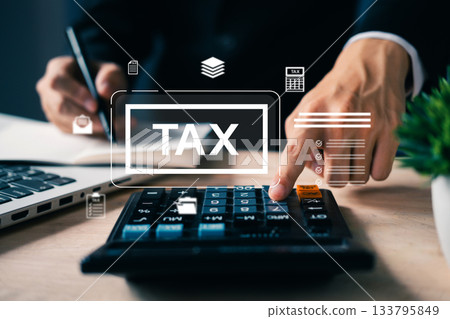 Close-up of hand pressing calculator with tax icons overlay, representing financial data analysis, tax return preparation, budgeting, and business accounting tasks. 133795849