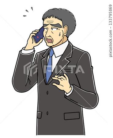 A middle-aged man in a suit talking on the phone with a troubled expression (upper body) 133795869