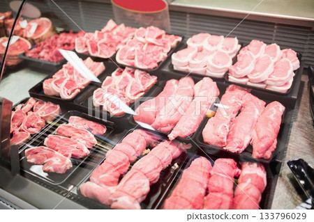 Raw meat slices in containers Raw meat slices in containers 133796029