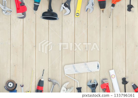 DIY tools on wooden background 133796161