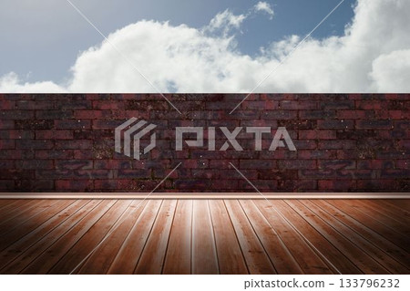 Flat design is showing wooden floor planks extending toward red brick wall under cloudy blue sky 133796232