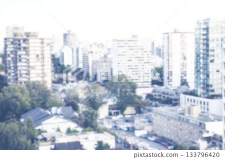 High-rise and mid-rise towers are rising in flat design urban area with parked cars, overcast sky 133796420