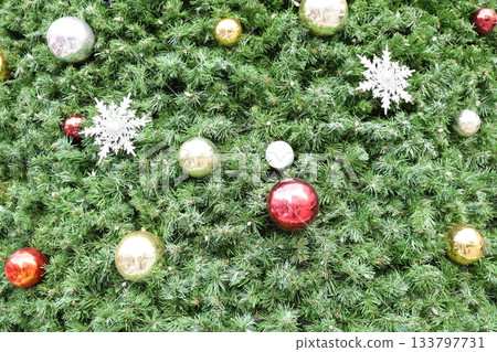 Ornaments decorated with a Christmas tree 133797731
