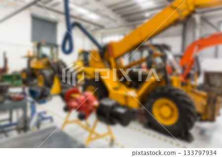 Yellow telescopic handler is standing in flat design maintenance workshop showing blue hoist hook Yellow telescopic handler is standing in flat design maintenance workshop showing blue hoist hook 133797934