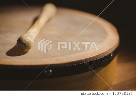Wooden bodhran with stick 133798185