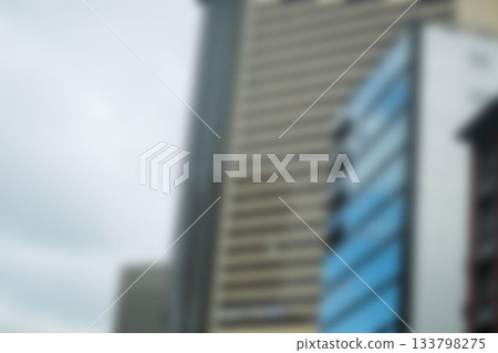 Modern buildings against cloudy sky Modern buildings against cloudy sky 133798275
