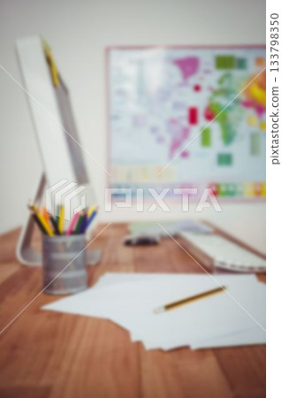 Papers by desktop pc on desk Papers by desktop pc on desk 133798350