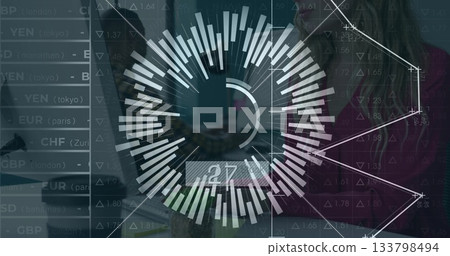 Displaying circular radial chart, coworkers viewing currency rates on laptops at open-plan office 133798494