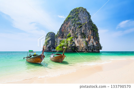 Panoramic view of Ao Phra Nang Beach with thai traditional wooden longtail boat, white sand and turquoise water in Krabi province. Ao Nang, Thailand. 133798570