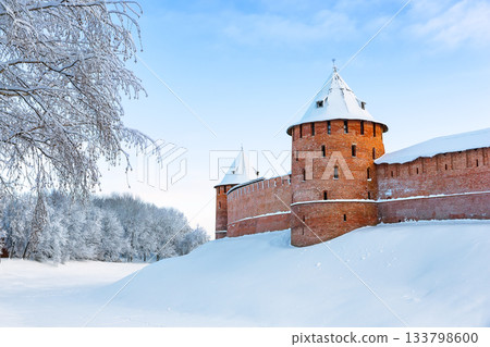Novgorod Kremlin in winter sunny day in Veliky Novgorod, Russia. Towers of Kremlin fortress in frosty cold winter in Veliky Novgorod. Novgorod Kremlin in winter sunny day in Veliky Novgorod, Russia. Towers of Kremlin fortress in frosty cold winter in Veliky Novgorod. 133798600