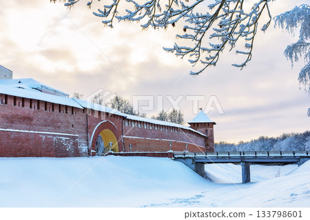 Novgorod Kremlin in winter day at sunset in Veliky Novgorod, Russia. Towers of Kremlin fortress in frosty cold winter in Veliky Novgorod. 133798601