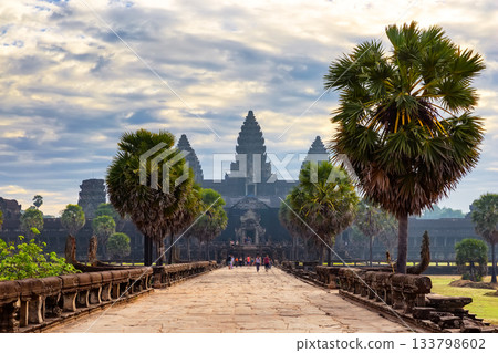 Amazing view of famous Angkor wat temple in Siem Reap, Cambodia, at sunrise. Angkor Wat in Cambodia is the largest religious monument in the world. Amazing view of famous Angkor wat temple in Siem Reap, Cambodia, at sunrise. Angkor Wat in Cambodia is the largest religious monument in the world. 133798602